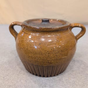 Antique Brown Glazed Stoneware Bean Pot with Lid Ribbed Base Dual Handles image 1