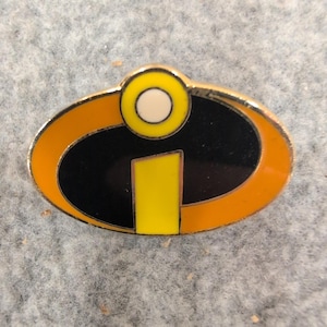 Disney Pixar The Incredibles Logo Enamel Pin Gold Tone Superhero Accessory image 1