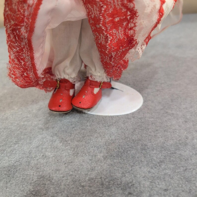 Ashley Belle Porcelain Mexican Doll With Stand Red White Lace Dress Hoop Earring image 4