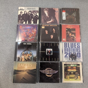 12 CD Lot 70s 80s Rock Santana Eagles ABBA Moody Blues Doobie Bros Don Henley image 1