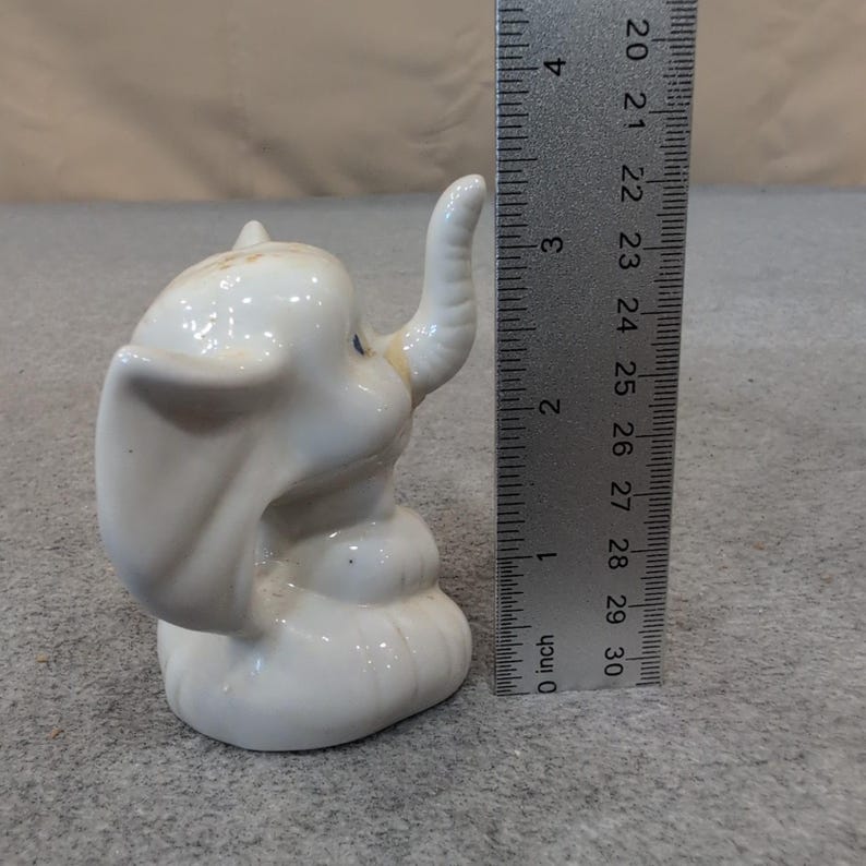 Vintage White Ceramic Elephant Figurine Seated Trunk Up Blue Eyes Bow Tie image 2