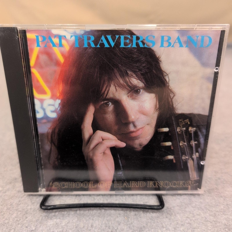 Pat Travers Band, School of Hard Knocks, cd 1990, afleveringsrecords LUSCD 4 Rock afbeelding 1