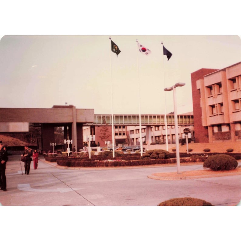 Vintage 1970s Osan Air Base Korea Headquarters Complex Flags Photo image 1