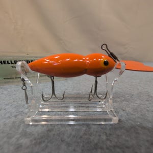 Whopper Stopper Hellbender Esca da pesca vintage arancione 1130 con scatola immagine 1