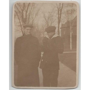 Vintage 1910s-1920s Sepia Photo Two Men Winter Coats Newsboy Caps image 1