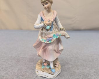 Vintage Porcelain Bisque Woman Figurine with Flower Basket Pink Blue White Decor