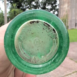 Botella de Coca-Cola vintage de Anniston, Alabama, de 1957, con diseño de falda estrecha y 177 ml (6 oz) de vidrio verde. imagen 2