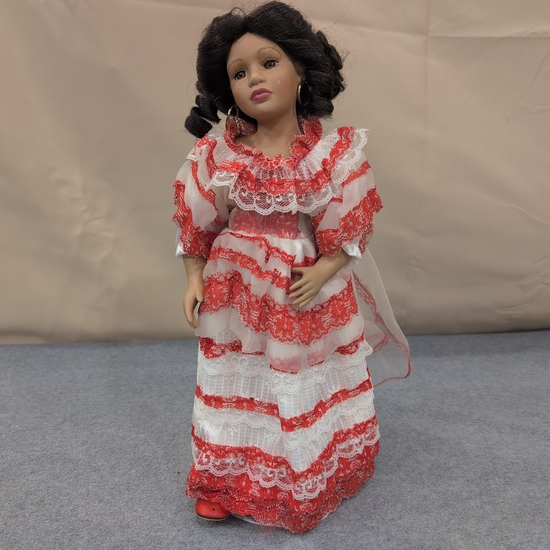 Ashley Belle Porcelain Mexican Doll With Stand Red White Lace Dress Hoop Earring image 1
