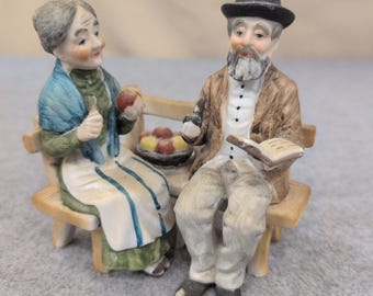 Vintage Hand Painted Porcelain Elderly Couple on Bench Figurine Matte Finish