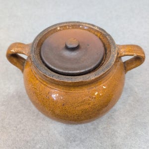 Antique Brown Glazed Stoneware Bean Pot with Lid Ribbed Base Dual Handles image 2