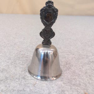 Vintage Silver Tone Ornate Crest Shield Hand Bell Decorative Service Bell image 1