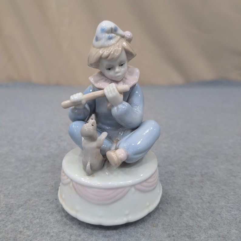 Meico Inc Porzellan Clown Flötenspieler Spieluhr Figur Blau Rosa Pastell VG + Bild 1