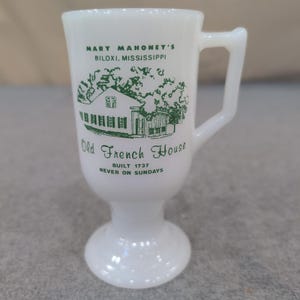 Mary Mahoneys Old French House Biloxi Mississippi Milk Glass Footed Mug White image 1