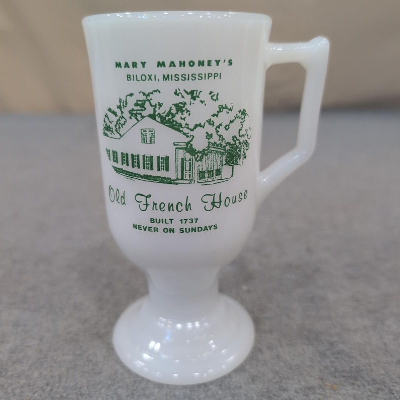 Mary Mahoneys Old French House Biloxi Mississippi Milk Glass Footed Mug White image 1