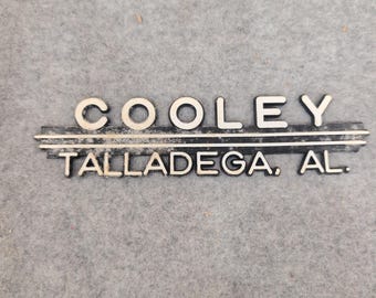Vintage Cooley Talladega AL Dealer Emblem Plastic Car Badge Nameplate Alabama