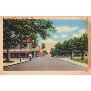 Vintage jaren 1940 Rue Anatole France Noumea NC ansichtkaart Street Scene Cyclist afbeelding 1