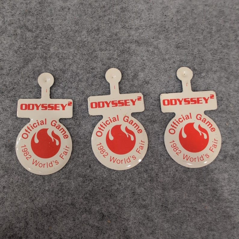 3 Odyssey2 Official Game 1982 Worlds Fair Metal Tokens Pins Magnets image 1