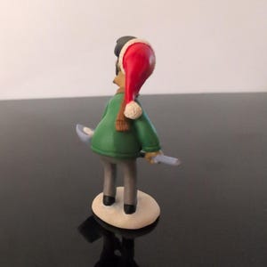 The Simpsons Apu Christmas Figurine Santa Hat Snow Shovel Winter Collectible image 3
