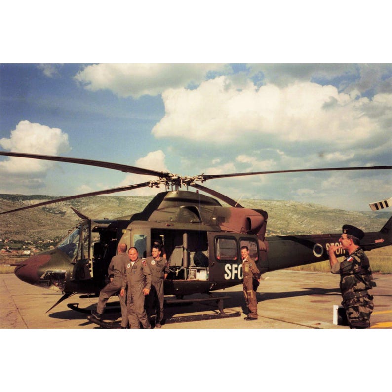 Vintage 1999 SFOR Bosnia UH-1N Helicopter Airfield Photo Lot 6x4 image 1