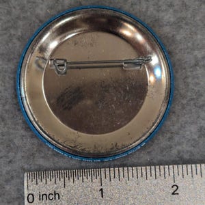 Trips Unltd. Ski The Ski Trip Professionals Vtg Button Pin We'll Move Mountains image 2