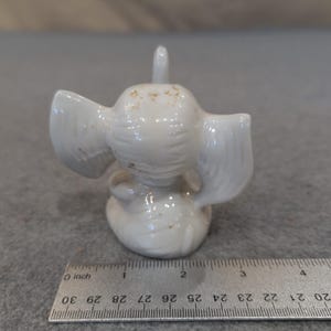Vintage White Ceramic Elephant Figurine Seated Trunk Up Blue Eyes Bow Tie image 3