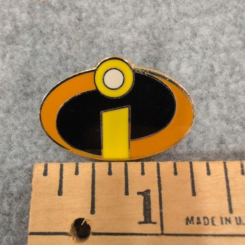 Disney Pixar The Incredibles Logo Enamel Pin Gold Tone Superhero Accessory image 2