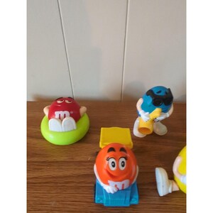 Veel van 7 Burger King M & M vintage speelgoed 1991 1997, dispensers naar achteren te trekken afbeelding 2