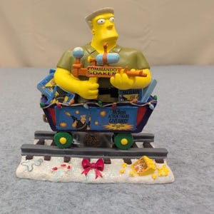 The Simpsons Christmas Express McBain Action Figure Giveaway Figurine 2005 0301 image 1