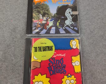 I Simpson cantano il blues e Ren Stimpy, sei un idiota! Pacchetto di CD con musica dei cartoni animati degli anni '90
