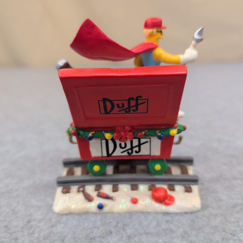 The Simpsons Christmas Express Holiday Spirits Duffman Sculpture 2005 imagen 3