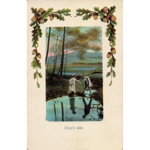 Postal antigua vintage "No te resbales" con pareja romántica y borde de hojas de roble, fabricada en Alemania. imagen 1