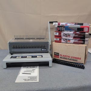 May include: A trio of ceramic mugs with a speckled, matte finish in cream, light grey, and dark grey. Each mug features a minimalist design and a rounded handle.