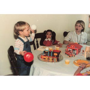 1987 Found Photo Stephen 2nd Birthday Train Cake Fire Station Toys 80s Snapshot image 1