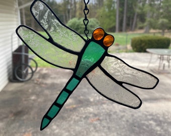 Stained glass dragonfly, teal and amber dragonfly