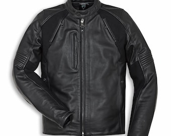 May include: Black leather motorcycle jacket with a stand-up collar and a full-length zipper. The jacket features quilted detailing on the shoulders and sleeves, and a small zippered pocket on the chest. The jacket has a streamlined, modern design.