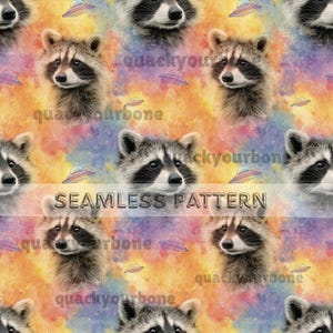 May include: Seamless pattern featuring raccoons, UFOs, and a colorful, galaxy-like background. The design includes the text "SEAMLESS PATTERN" and the brand name "quackyourbone". The raccoons have black and white fur, and the UFOs are purple and pink.
