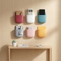 Wall Mount Phone Holder – Adhesive Storage Pocket for Remotes, Phones, Accessories Bedroom Living Room product logo