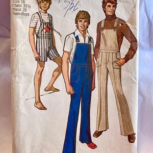 May include: Vintage Simplicity sewing pattern featuring three teen boy outfits. The pattern includes a striped shorts set with a star, blue overalls, and striped overalls with a brown turtleneck. Size 16, chest 33.5 inches, waist 28 inches.