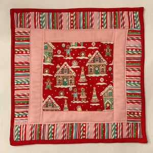 May include: A rustic wooden sign with the text "Welcome to our home" in a handwritten style. The sign is rectangular, with a distressed finish, and features a simple, inviting design. It's suitable for indoor or outdoor use.