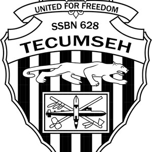 May include: Black and white emblem with the text "UNITED FOR FREEDOM" and "SSBN 628 TECUMSEH". The emblem features a stylized cougar, vertical stripes, and a rectangular design with various illustrations.
