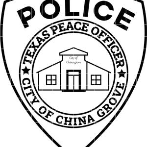 May include: Black and white police badge with the word "POLICE" at the top. The badge features the text "TEXAS PEACE OFFICER" and "CITY OF CHINA GROVE" around a central image of a building. The building has the text "City of China grove" above it.