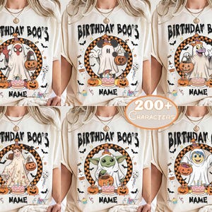 May include: A cream-colored t-shirt featuring a graphic of a ghost wearing a party hat, holding a pumpkin bucket, and standing by a birthday cake. The design includes a checkered circle, bats, and the text BIRTHDAY BOO'S and NAME.