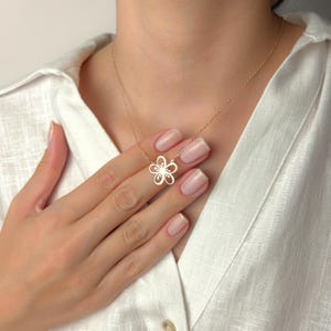 Gold Orchid Flower Pendant Necklace – Dainty Floral Cutout Jewelry, Minimalist Nature-Inspired Necklace, Elegant Botanical Gift for Women