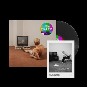 May include: A vinyl record and a photo print featuring Mae Martin. The record cover has a colorful circle with the text "MAE MARTIN I'M A TV". The photo print is black and white, showing Mae Martin sitting on a chair. The record is black.