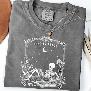 Skeleton Reading T-Shirt: Book Lover Halloween Tee - Comfort Colors®