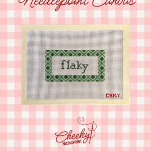 May include: Needlepoint canvas with the word "flaky" in a green frame. The canvas is white with a grid pattern, and the background is a pink and white checkered pattern. The text "CHKY" is in the lower right corner.