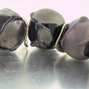 Made To Order(MTO) –Handmade Black wrapped with Loads of Silver Plum Shards Round Lampwork Beads sET