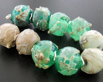 Made To Order(MTO) --Handmade Mixed Pastel Green Decorated with Silvered Ivory Shards and Loads of Fine Silver Trail Round Lampwork Beads