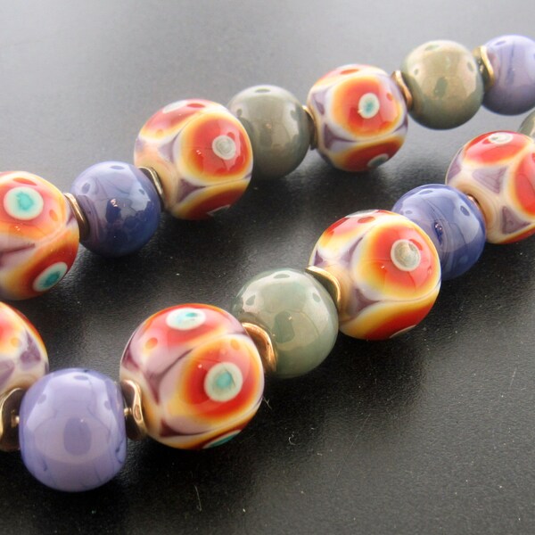 Handmade Purple, Opal Yellow and Rubino Oro Lampwork Beads  with spacers