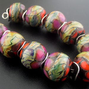 Made To Order (MTO) –Handmade Black Wrapped in Fine Silver Foil Decorated with Raku Twisty Purple Rose  and Coral Round Lampwork Beads